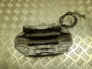 Tesla 20C84701-00 / 20C8470100 Model Y 2022 Stabdžių apkaba kairė priekis